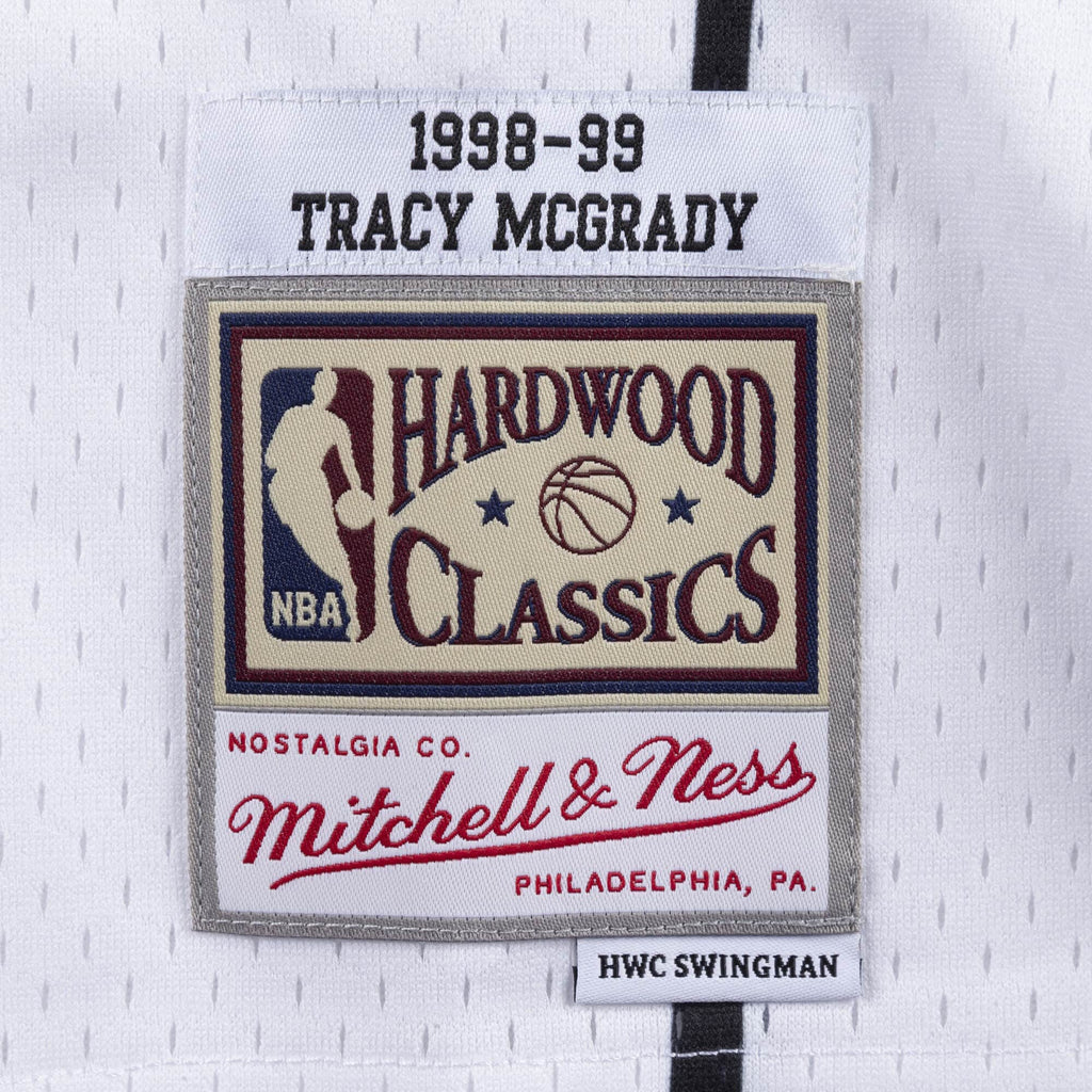 Mitchell & Ness NBA Men's Toronto Raptors Tracy McGrady 1998-99 Hardwood Classics Reload Swingman Jersey