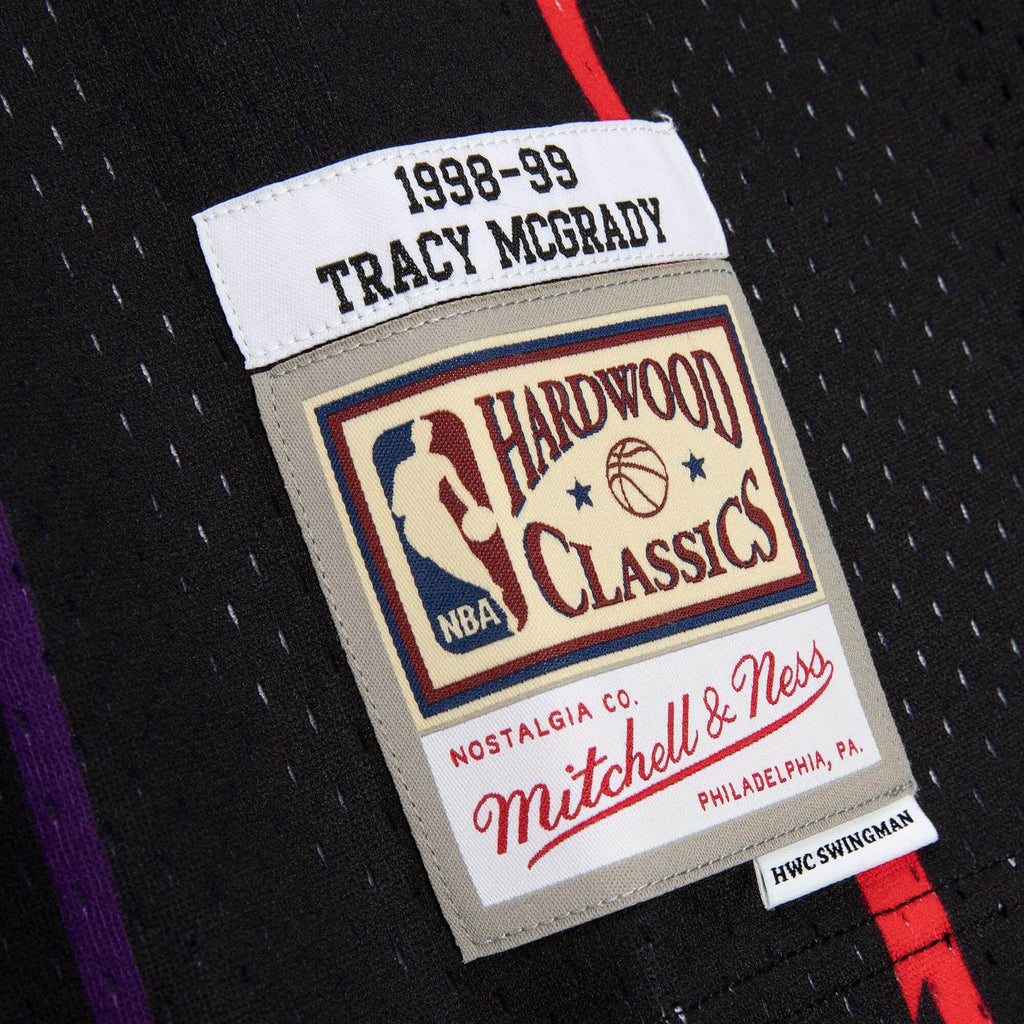Men's Mitchell & Ness Tracy McGrady Purple Toronto Raptors 1998/99 Galaxy Swingman Jersey Size: Medium