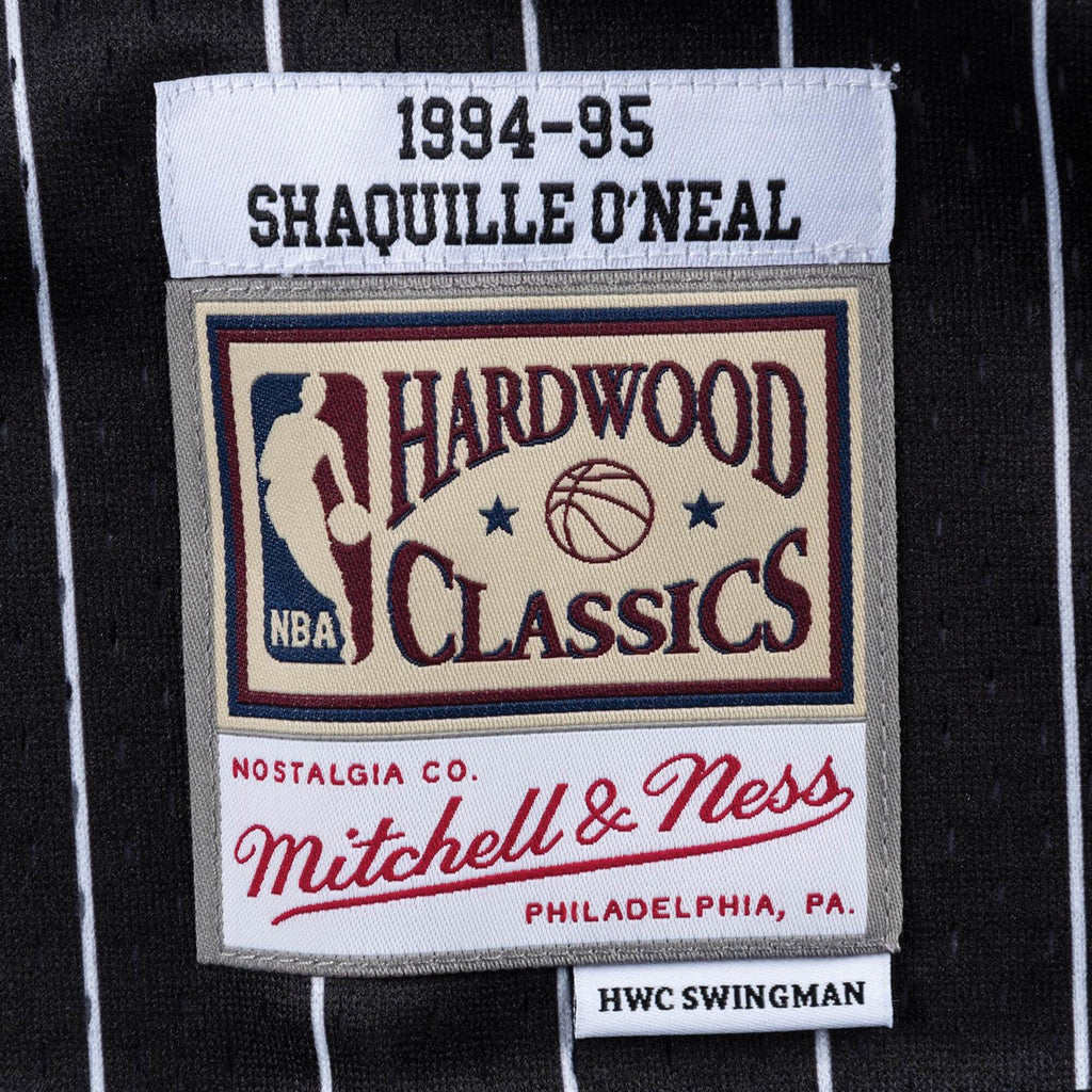 Mitchell & Ness NBA Men's Orlando Magic Shaquille O'Neal 1994-95 Hardwood Classics Swingman Alternate Jersey