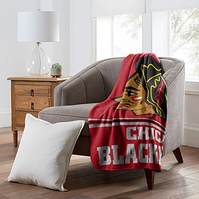 The Northwest Company NHL Chicago Blackhawks Fade Away Fleece Throw Blanket
